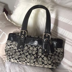 Black and gray  coach purse